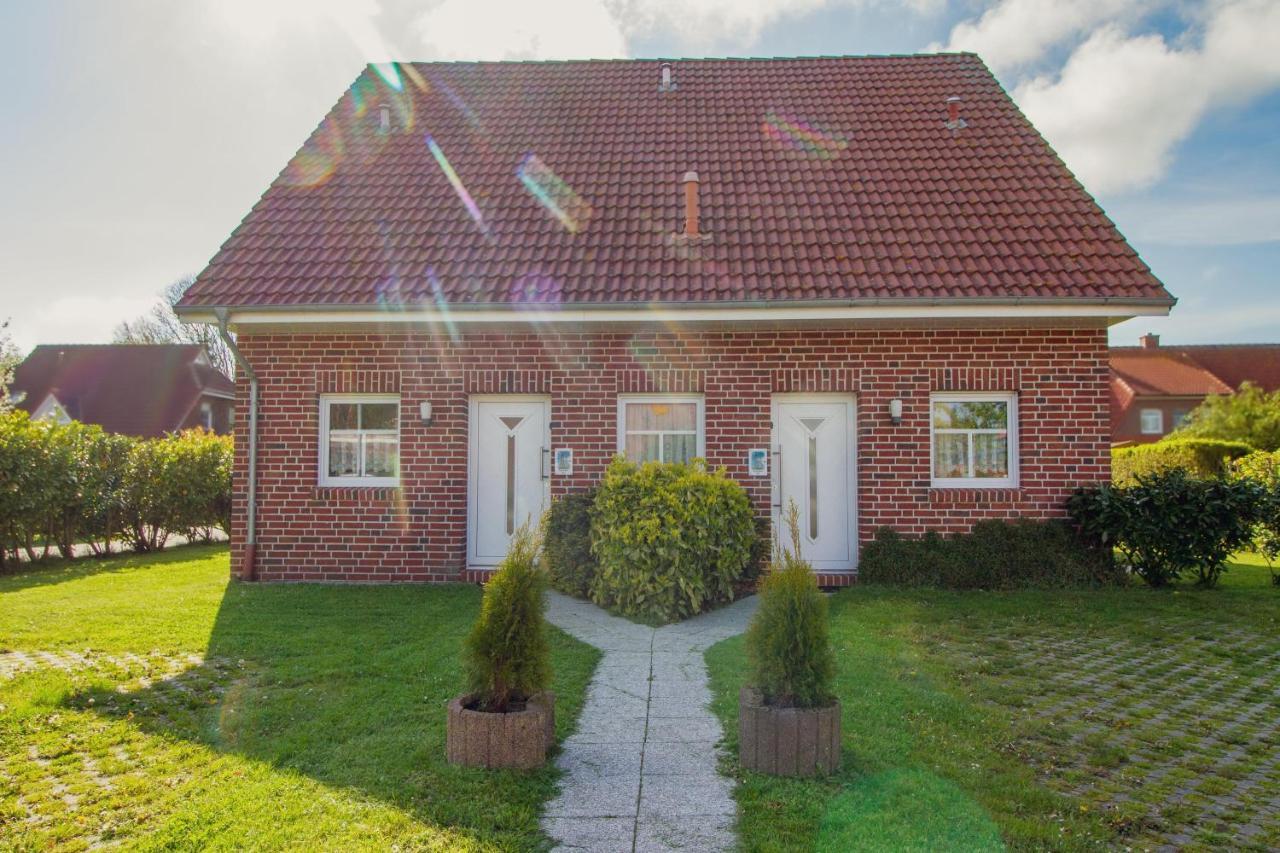 Ferienwohnung Haus Leuchtturm - Ebbe Krummhörn Exterior foto